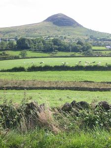 Slemish, mountain in County Antrim where St Patrick is reputed to have shepherded as a slave Photo: Man vyi Wikimedia commons