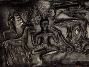 Antlered figure holding a serpent and a torc, depicted on the Gundestrup cauldron. (c. 200BC-300AD) The Gundestrup cauldron is housed at the National Museum of Denmark.