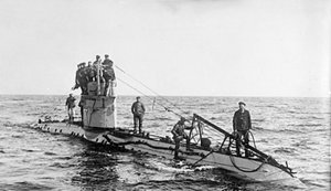 The crew of a German UC-1 class submarine on deck.  wikimedia commons