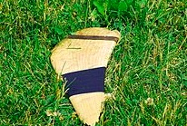 "Cracked and splintered hurley"   Jeff Meade Philadelphia, US   Wikimedia Commons 