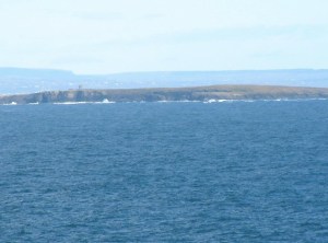 Photograph of Mutton Island with promontory Fort.  © Copyright Charles W Glynn and licensed for reuse under this Creative Commons Licence http://www.geograph.ie/photo/14048,