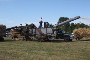 Threshing Machine In Action Photo: Ben Franske Wikimedia Commons